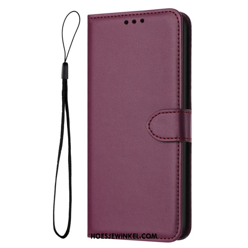 Folio-hoesje iPhone 16 Pro Telefoonhoesje Effen Leereffect Met Riem